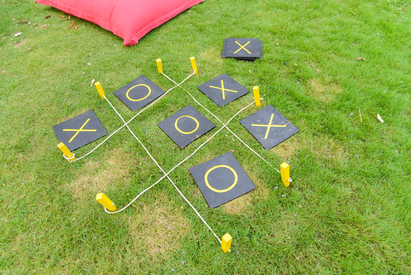 why is a draw game in tic tac toe called a cat's game