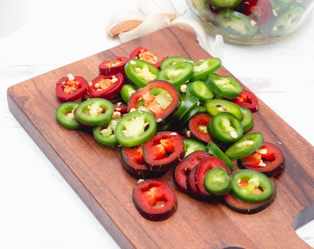 jalapeno peppers on cutting board